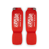 Katsudo parastinchi e protezioni collo del piede Strike, rosso